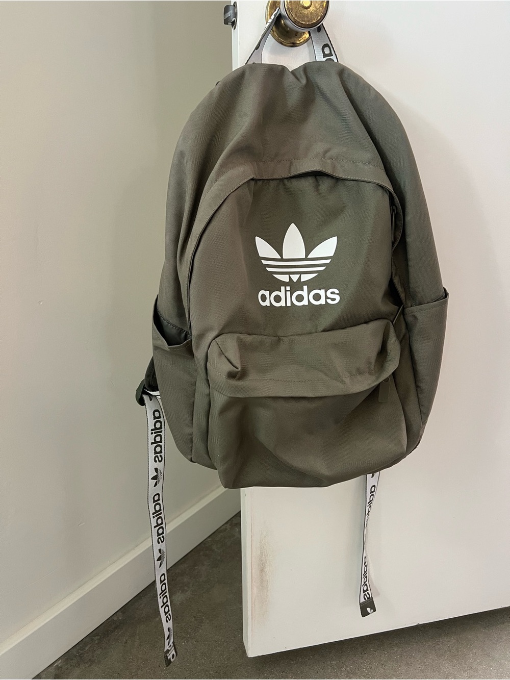 adidas olive green backpack with white logo